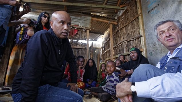 Ahmed Hussen, left, Canada’s Minister of Immigration, Refugees & Citizenship who was born and raised in Somalia and immigrated to Canada in 1993, speaks to a Somali refugee family who fled from Kismayo six years ago, and translates the conversation to U.N. refugee chief Filippo Grandi, right, during a visit to Dadaab refugee camp, which currently hosts over 230,000 inhabitants, in northern Kenya Tuesday, Dec. 19, 2017.
Photo Credit: Ben Curtis